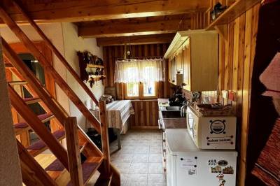 Obývačka prepojená s kuchyňou, Chata Limba pod Kriváňom, Pribylina