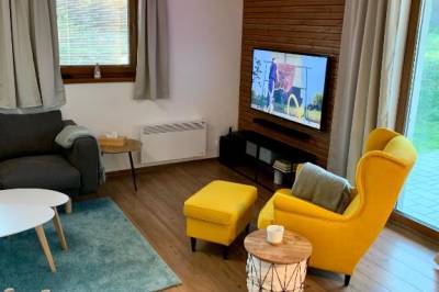 Obývačka s TV a kreslom, Domček &amp; SAUNA garden, Stará Lesná
