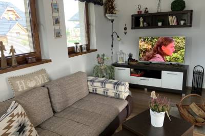 Obývačka s rozkladacím gaučom a LCD TV, Villa Rocky View, Stará Lesná