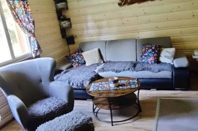 Obývačka s gaučom, Chata JJParadise, Oravice