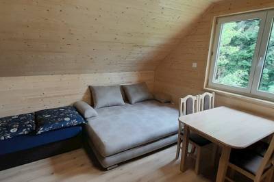 Malá drevenica – izba s dvomi 1-lôžkovými posteľami a rozkladacou pohovkou, Drevenica Rybárie, Korňa