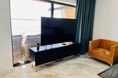 LCD TV v obývačke, Vila Slnečná Lagúna, Kaluža