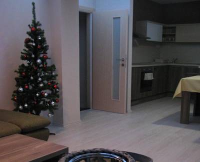 Apartmán Bystrá - obývačka prepojená s kuchynkou s jedálenským sedením, Simply Relax Apartment Resort, Bystrá