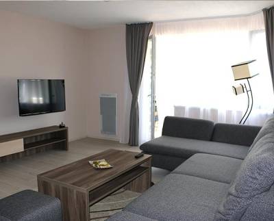 Apartmán Janka - obývačka s rohovou sedačkou a LCD TV, Simply Relax Apartment Resort, Bystrá