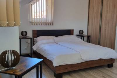 Spálňa s manželskou posteľou, Vila Bikehouse, Veľká Lomnica