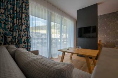 Apartmán na prízemí - obývačka s gaučom a LCD TV, Chalet Ski, Demänovská Dolina