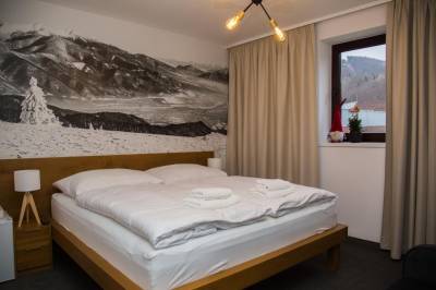 Apartmán s jednou spálňou (Dvojlôžková izba) - spálňa s manželskou posteľou, Snowland Apartmány, Valča