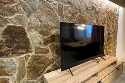 LCD TV v obývačke, MARMOT Mountain Apartment, Vysoké Tatry