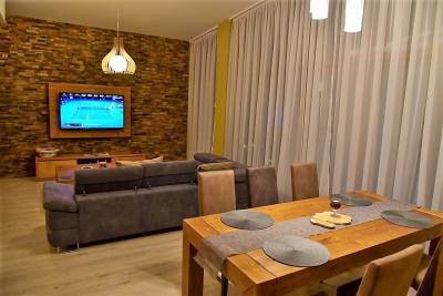 Obývačka s rozťahovacím gaučom pre 2 osoby, Apartmán A404 LAGEMA, Vysoké Tatry