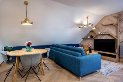 Obývačka s TV a jedálenským posedením, AC Cactus Luxury Apartment High Tatras, Veľká Lomnica