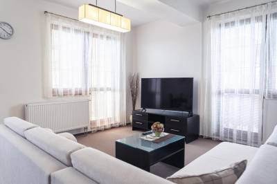 Obývačka s TV a balkónom, AC Apartment High Tatras View - Veľká Lomnica, Veľká Lomnica
